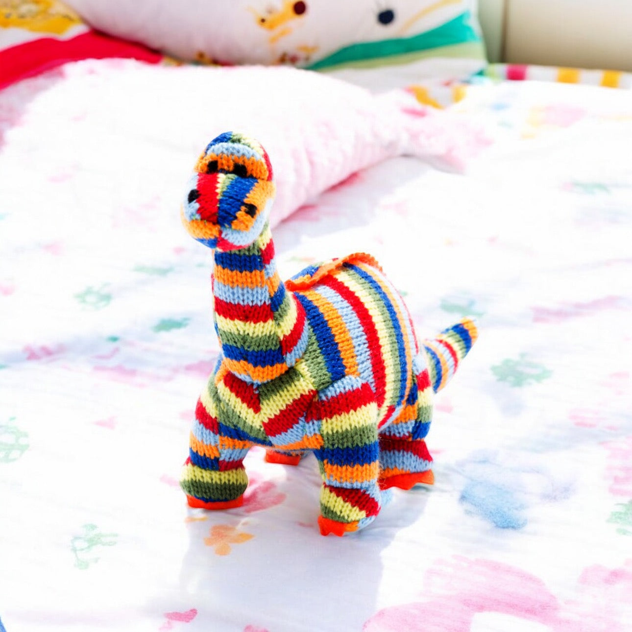 Knitted Diplodocus Rattle Rainbow Stripes