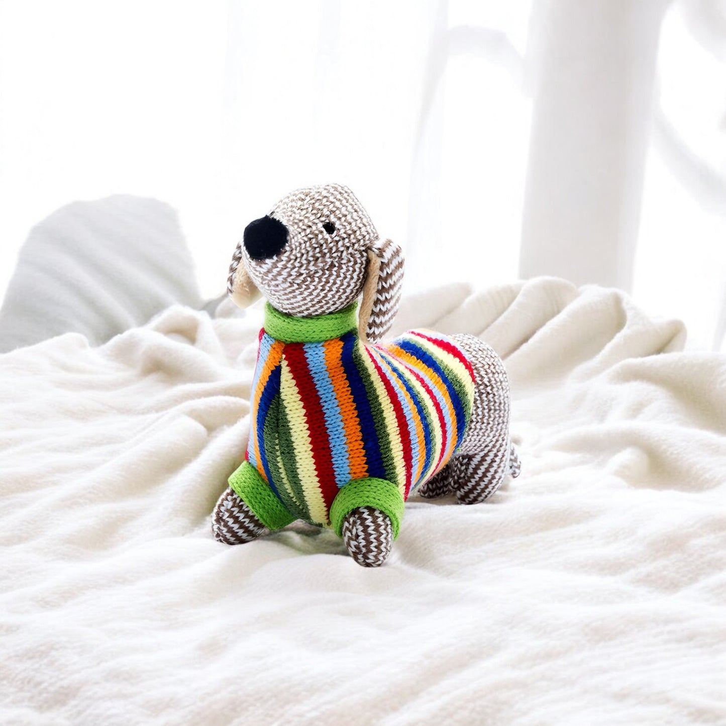 Knitted Sausage Dog (Dachshund) Rattle With Rainbow Stripe Sweater